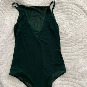 Sheer green body suit